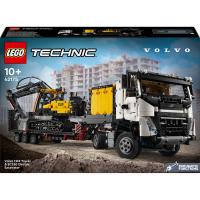 Nákladní auto Volvo FMX a elektrický bagr Volvo EC230